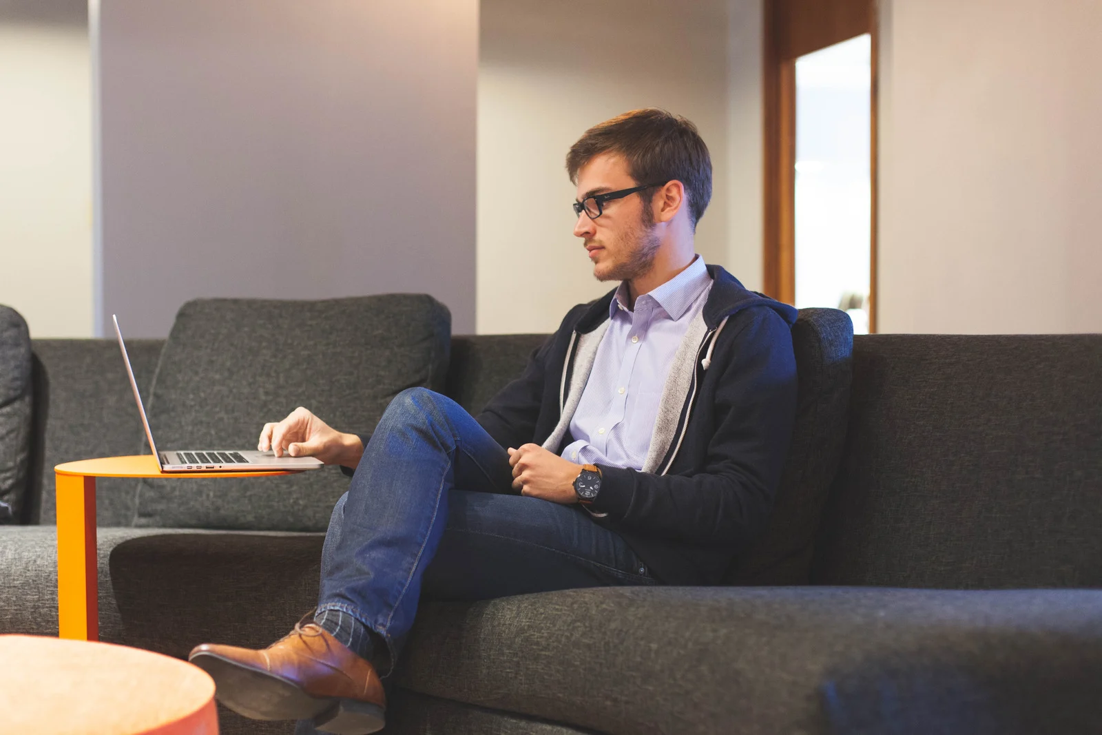 Senior developer enthusiastically solving software problem